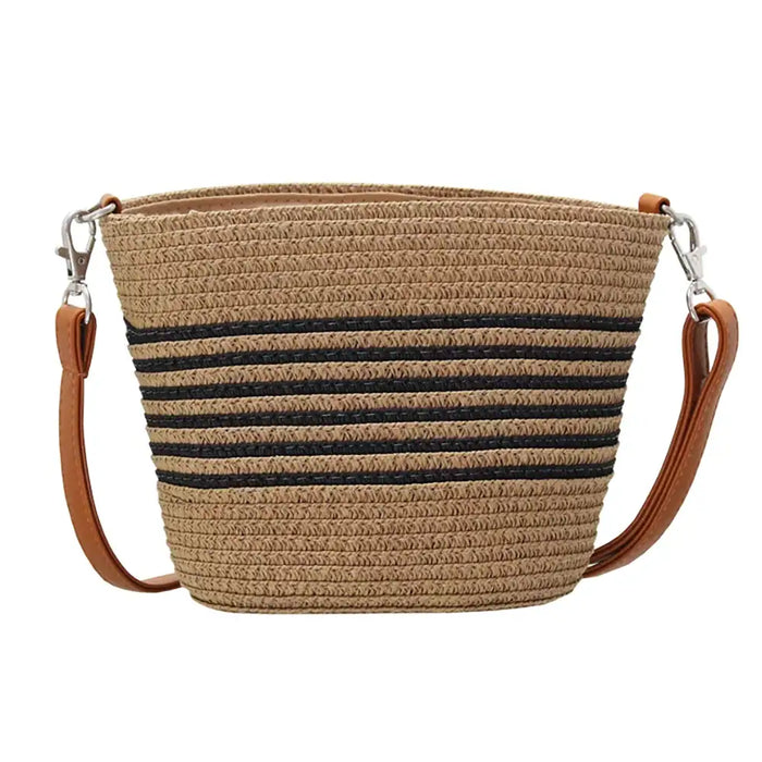 Woven handbag with striped pattern and brown leather straps on a white background