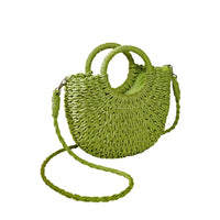 Fuchsia Lime Green straw bag with a rounded straw covered handle . 