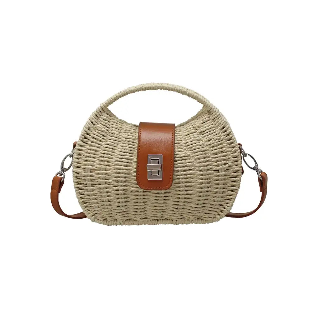 Woven handbag with brown leather accents on a white background