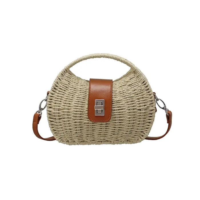 Woven handbag with brown leather accents on a white background