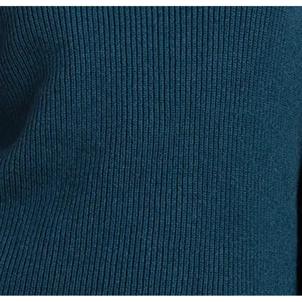 Close-up of a dark teal blue ribbed knit fabric texture.