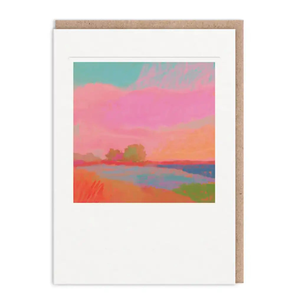 Colorful landscape painting on a white card with a brown envelope.