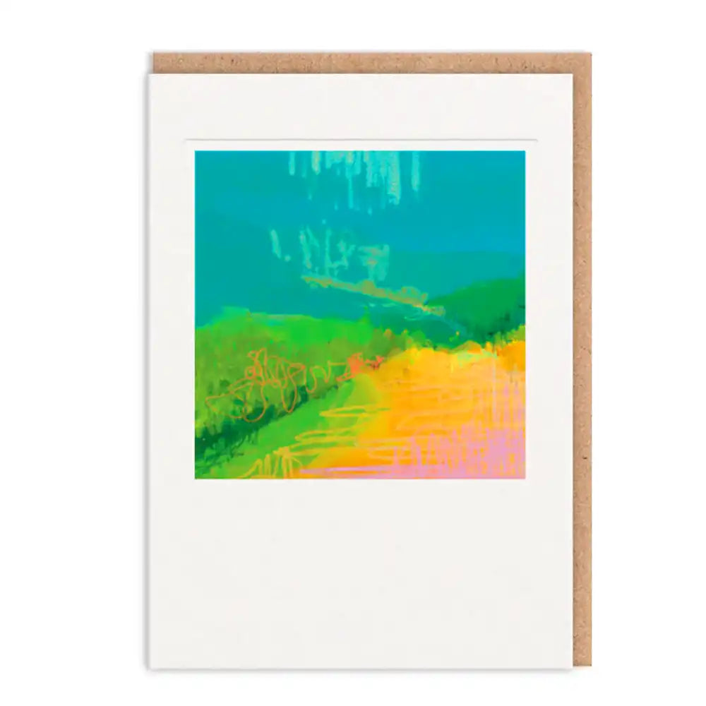 Framed abstract art print with colorful landscape design on a white background