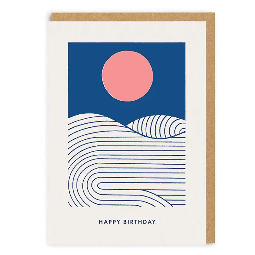 Greeting card with a stylized landscape design featuring a pink sun and wavy lines, with 'Happy Birthday' text.
