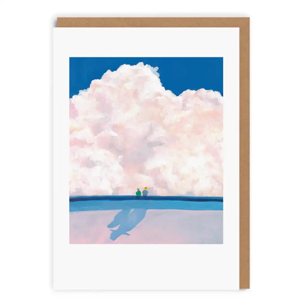 Greeting card with a stylized illustration of two figures on a beach under a large cloud, with a wooden border.