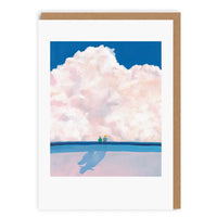 Greeting card with a stylized illustration of two figures on a beach under a large cloud, with a wooden border.