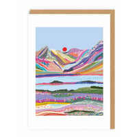 Colorful mountain landscape illustration on a greeting card with a wooden frame.