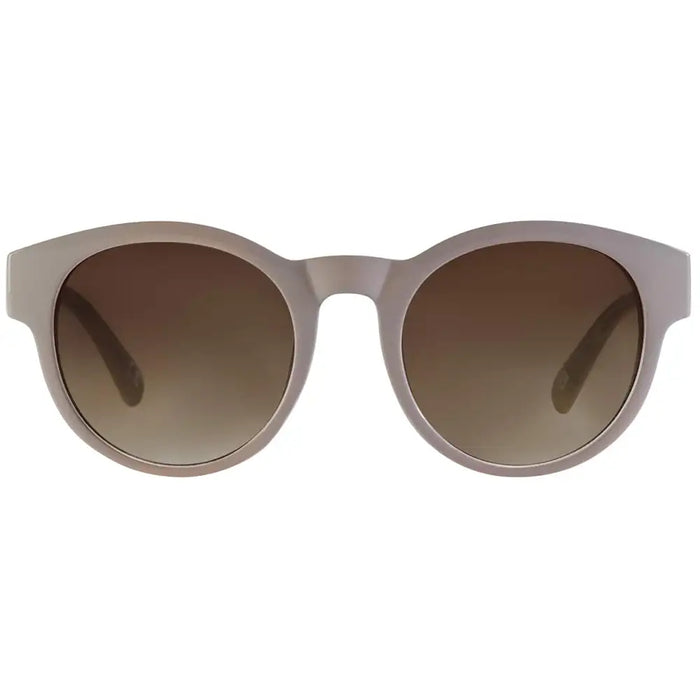 Beige sunglasses with brown gradient lenses on a white background