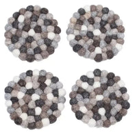 Set of four coasters. in grey tones. 