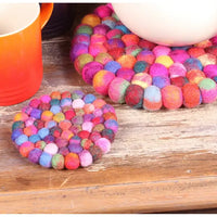 Felt bobbles joined to make a large round circle