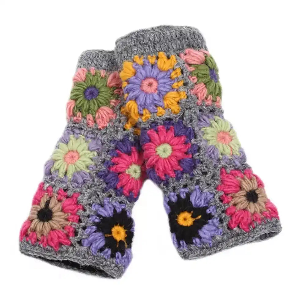 Colorful flower-patterned crochet gloves on a white background