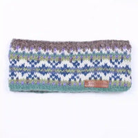A knitted headband with a multicolor Fair Isle pattern of blue, green, purple, and white, featuring a brown textured top band and a small brown leather brand patch.