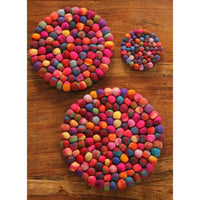Felt bobbles joined to make a large round circle. 2 large and one small. 