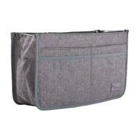 A small handbag organiser in linen look grey, featuring multiple compartments and a black zipper.