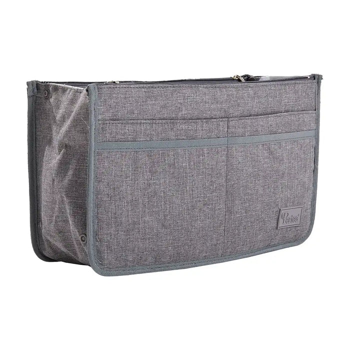 A small handbag organiser in linen look grey, featuring multiple compartments and a black zipper.