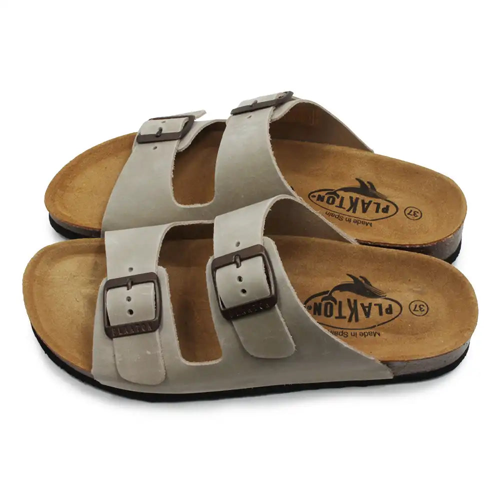 Pair of sandals with buckles on a white background