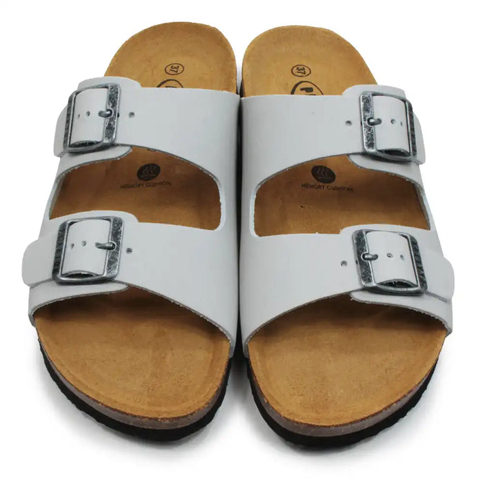 Pale grey sandals with brown soles on a white background