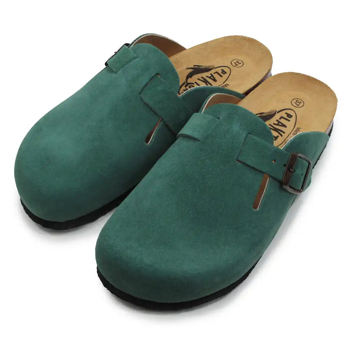 Pair of green suede clogs with a visible brand logo on a white background