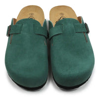 Pair of green suede clogs with brown buckles on a white background