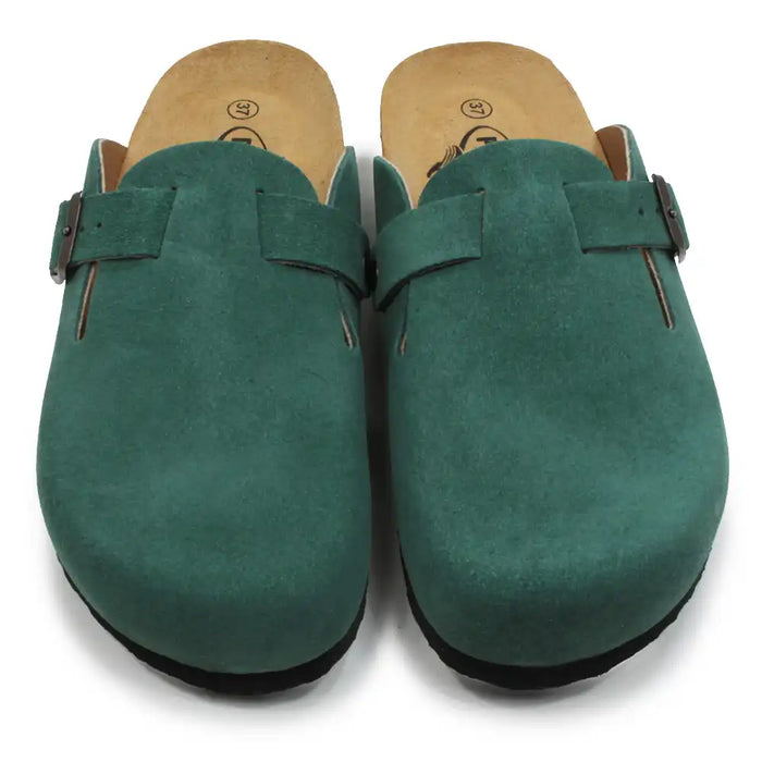 Pair of green suede clogs with brown buckles on a white background