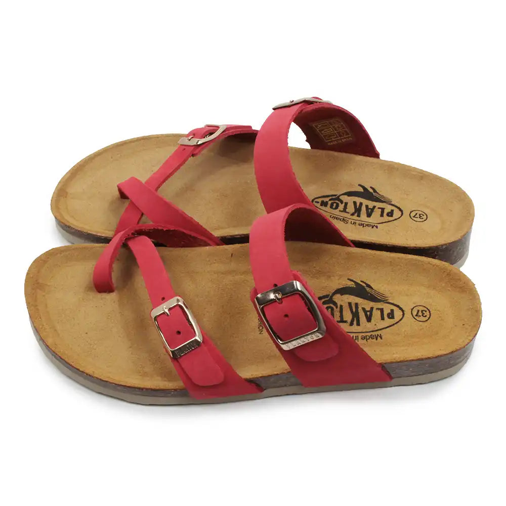 Red sandals with wooden soles on a white background