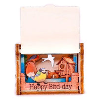 Greeting card with bird design and 'Happy Bird-day' text on a white background
