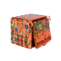 Decorative birthday bird box with floral patterns on a white background