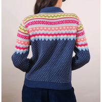 Colorful patterned sweater with a plain background