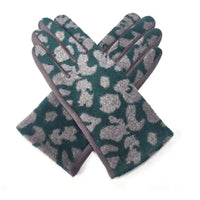 Gloves in green and grey animal print design on a white background