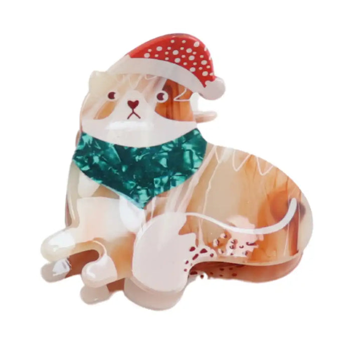 Picture of a cat wearing a Christmas hat and scarf hair claw clip.
