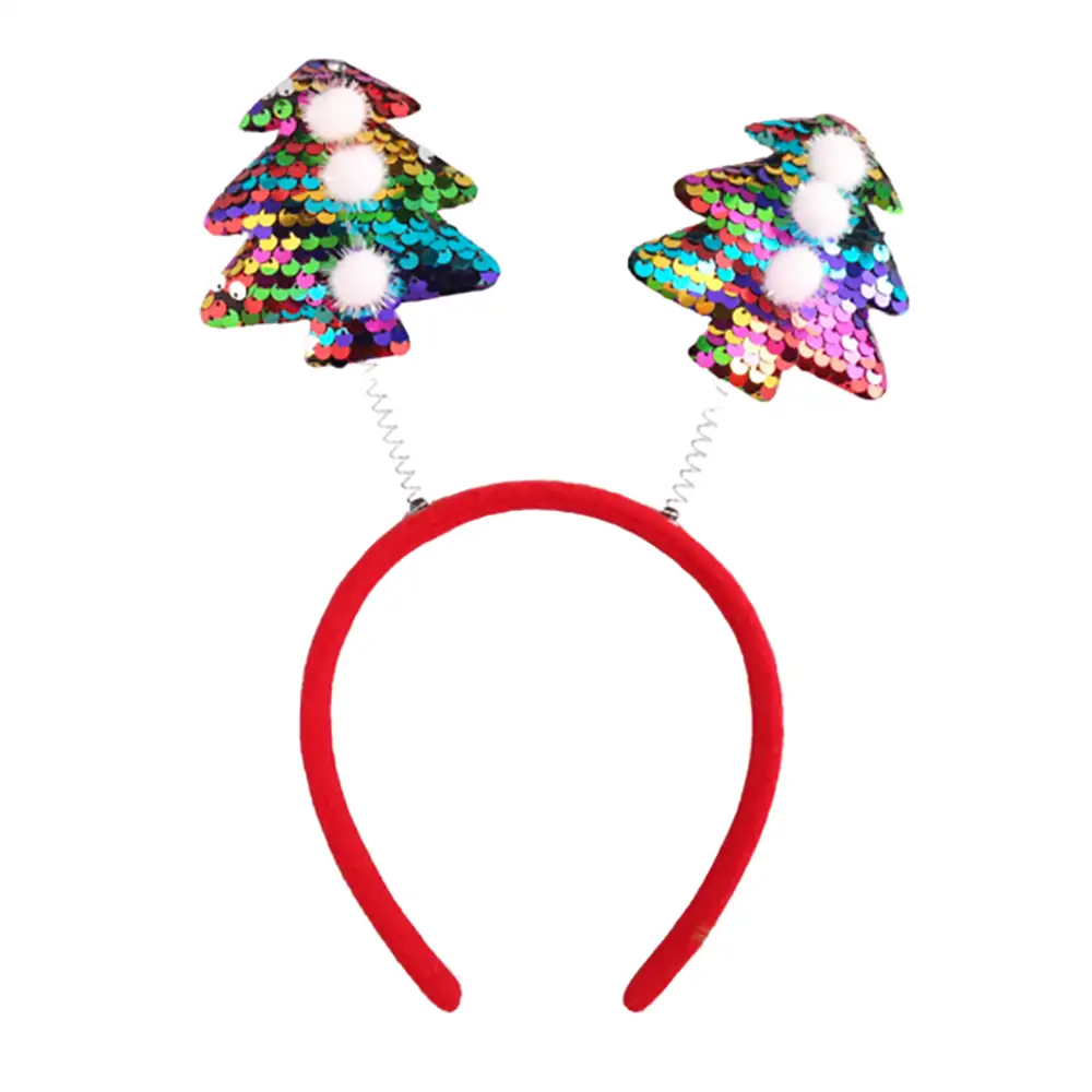 Red headband with colorful tree-shaped hair accessories on a white background