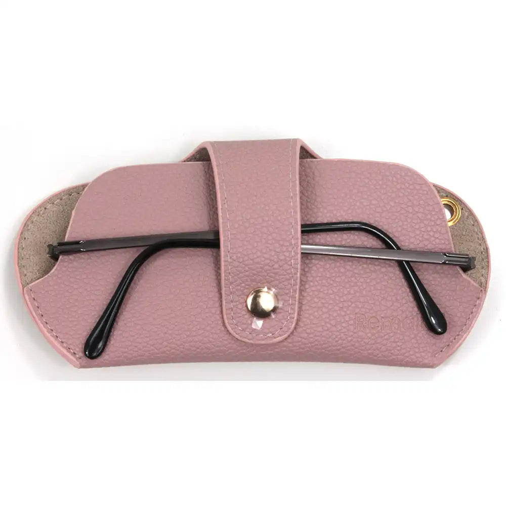 Pink glasses case with a pair of black glasses inside on a white background