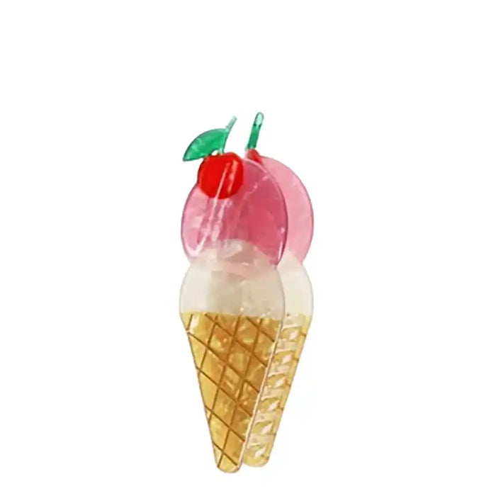 Hair clip in the shape of an ice cream cone on a white background.