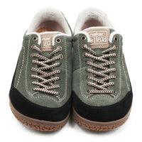 A pair of Rieker low-top sneakers in olive green suede with black suede toe caps, brown braided laces, and a white fleece lining, shown against a plain white background.
