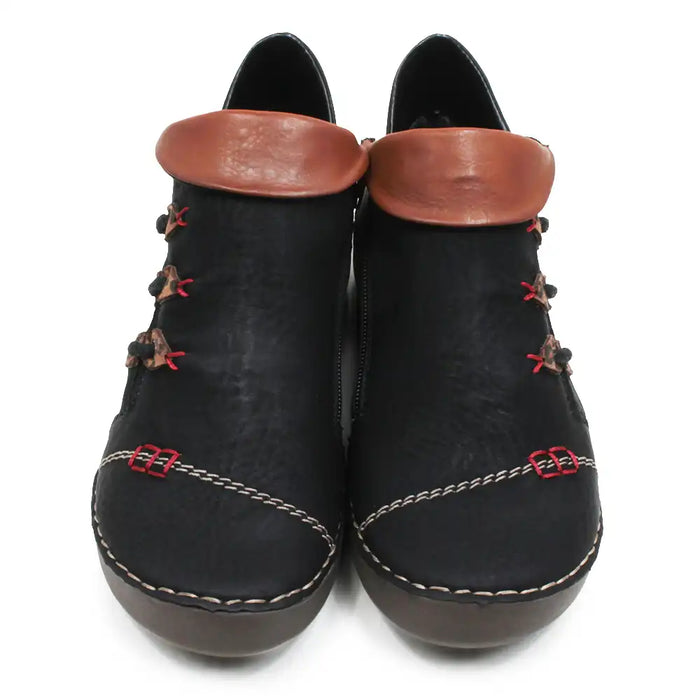 A pair of black faux leather ankle boots with brown faux leather trim around the collar, decorative red and brown laces, and contrast stitching on the toe, shown against a plain white background.