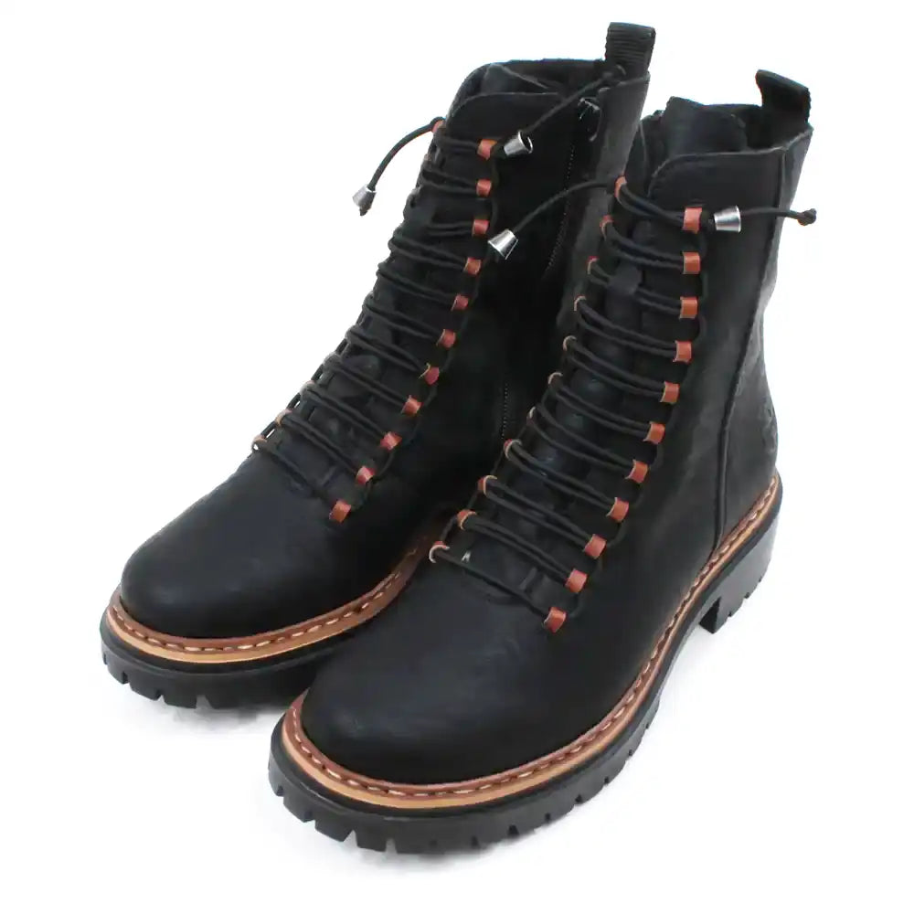 Pair of black laced boots with brown accents on a white background
