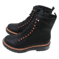 Pair of black laced boots with brown accents on a white background