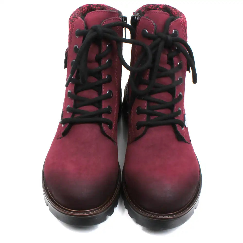 Rieker walking and activity boots in deep crimson. Black round laces in a 7 hole adjustment. Zip fastening. Wool cuffs a the ankles in a complementary mottled colour. Buckle detail at the ankle. Chunky deeply treaded soles. Front view.