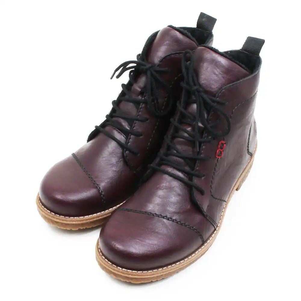 A pair of women's lace-up ankle boots in a deep burgundy leather, featuring black laces, contrast stitching, and light tan soles, shown on a plain white background.