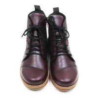 A pair of dark burgundy leather lace-up ankle boots with black laces and tan soles, shown from a top-down view on a white background.