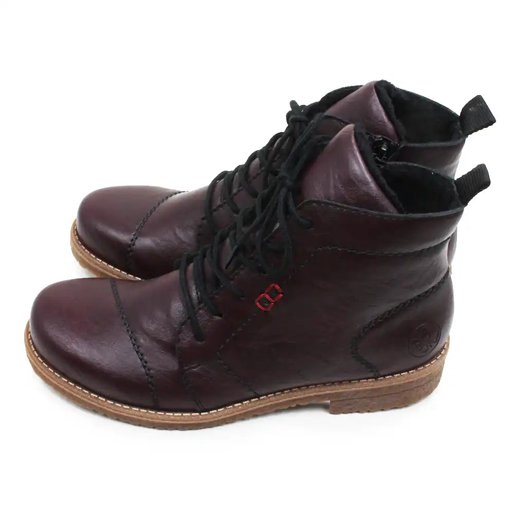 A pair of dark burgundy leather lace-up ankle boots with black laces, black interior lining, and a light brown sole, shown on a plain white background.