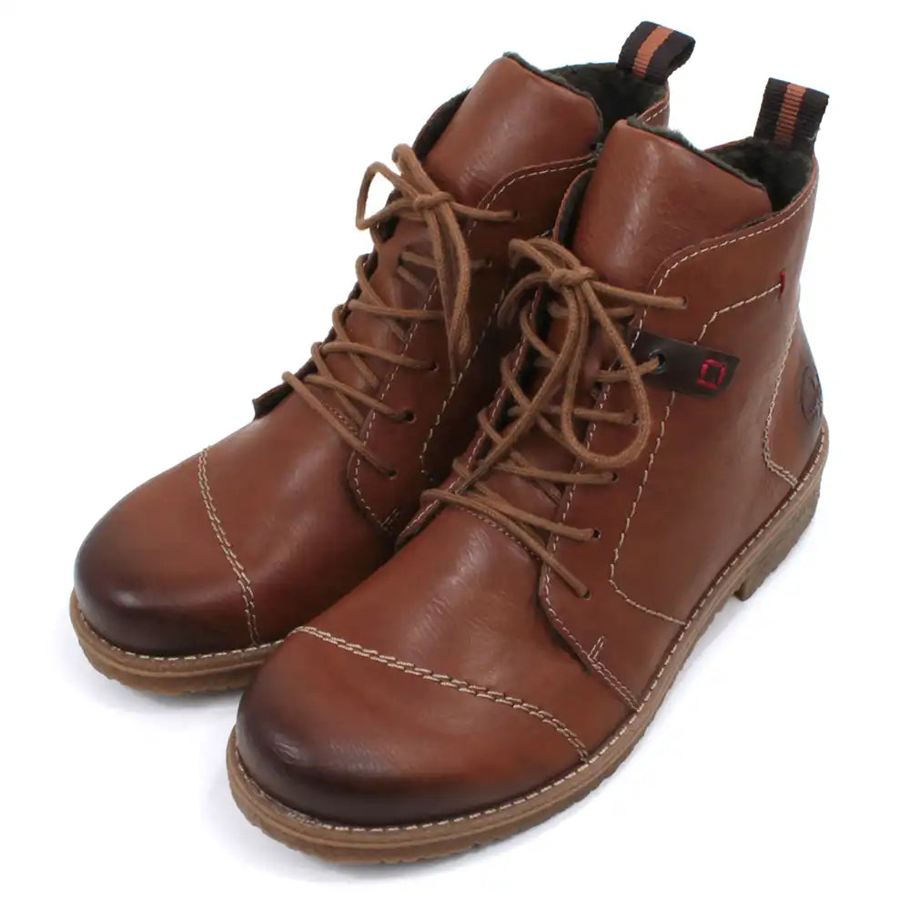 Pair of brown leather look boots with laces on a white background