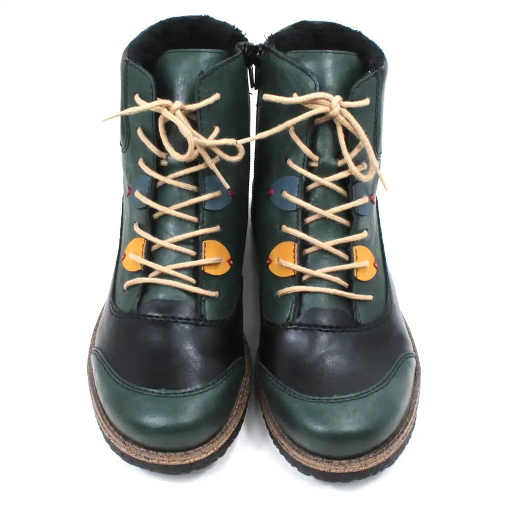 Pair of green and black boots with tan laces on a white background