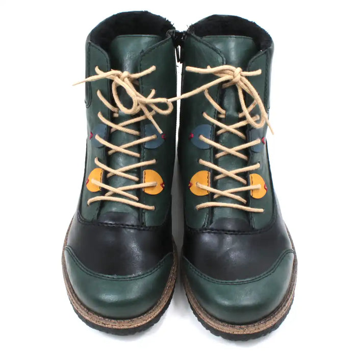 Pair of green and black boots with tan laces on a white background
