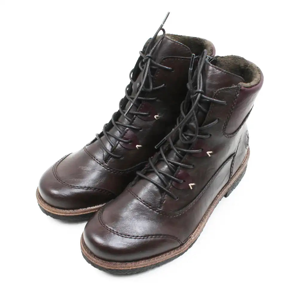 A pair of dark brown leather lace-up ankle boots with black laces and small gold-tone metal accents, shown on a plain white background.