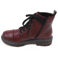 Red leather boot with black laces on a white background