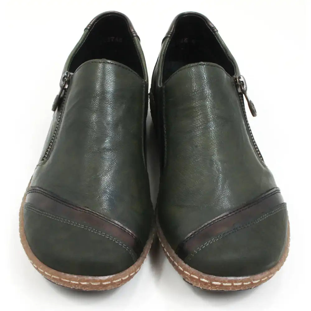 Rieker green flat everyday shoes with faux zip detail and rubber soles. Front view.