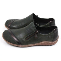 Rieker green flat everyday shoes with faux zip detail and rubber soles. Side view.