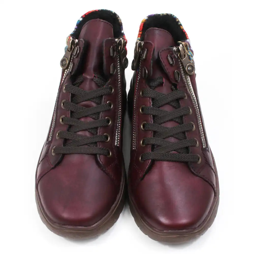 Maroon ankle boots with zippers and knitted ankle cuffs on a white background