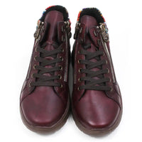 Maroon ankle boots with zippers and knitted ankle cuffs on a white background